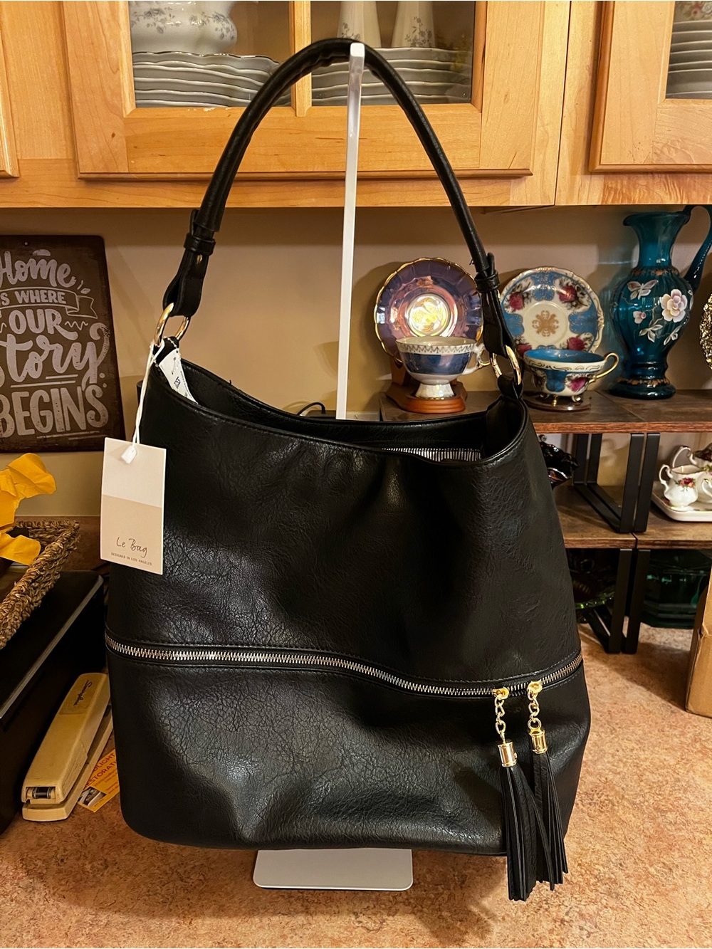 Black Faux Leather Hobo Bag with Tassel Zipper